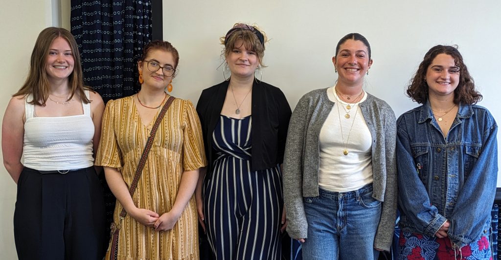 A group of five graduating students who are about to earn an MESP certificate. 